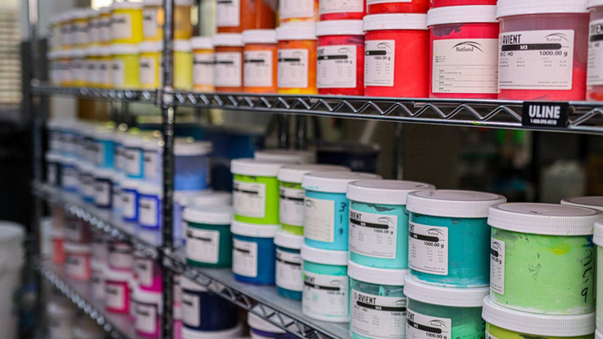 closeup of assorted colors of paints